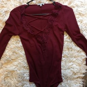 Red body suit size xs